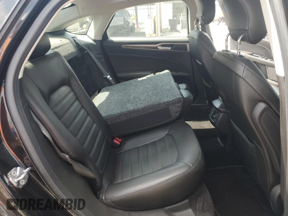 2013 Ford Fusion SE z VIN 3FA6P0H97DR215735, wystawiony jako Copart lot #62326335 z przebiegiem 100 312 mil mil oraz Szkoda całkowita • Salvage title. Historia ofert i sprzedaży dostępna na DreamBid. Obrazek 10.