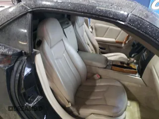 2005 Cadillac XLR z VIN 1G6YV34AX55601101, wystawiony jako Copart lot #75821644 z przebiegiem Nie podano mil oraz Szkody całkowita. Historia ofert i sprzedaży dostępna na DreamBid. Obrazek 10.