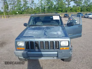 1999 Jeep Cherokee Sport with VIN 1J4FT68S9XL581835, listed as a IAAI auction lot 42499071 with 203,782 mi miles and . Bid and sale history available at DreamBid. Image 6.