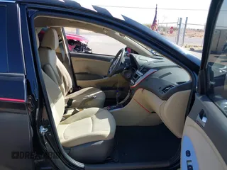 2014 Hyundai Accent GLS with VIN KMHCT4AE2EU749061, listed as a IAAI auction lot 42017566 with 93,929 mi miles. Bid and sale history available at carsss.com. Image 5.