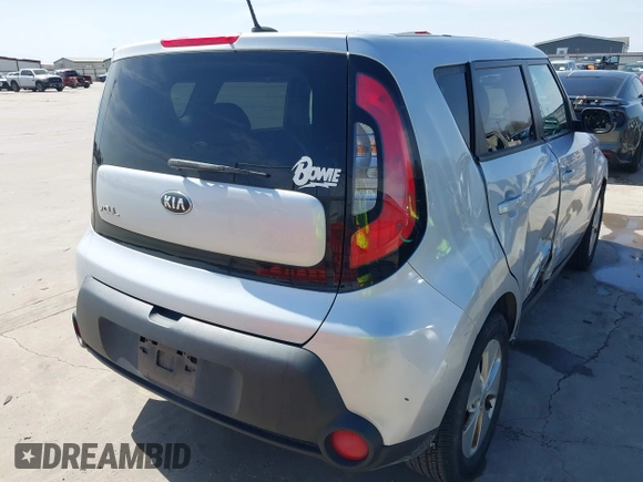 2014 Kia Soul with VIN KNDJN2A22E7738768, listed as a IAAI auction lot 41728768 with 70,013 mi miles. Bid and sale history available at carsss.com. Image 4.