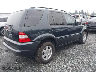 2002 Mercedes-Benz M-Class with VIN 4JGAB54E72A296354, listed as a IAAI auction lot 41277897 with 101,842 mi miles. Bid and sale history available at carsss.com. Image 4.
