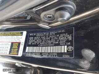 2015 Toyota Camry Hybrid LE with VIN 4T1BD1FK5FU166653, listed as a IAAI auction lot 41412963 with 105,428 mi miles. Bid and sale history available at carsss.com. Image 9.