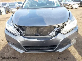 2018 Nissan Altima 2.5 SV with VIN 1N4AL3AP9JC166273, listed as a IAAI auction lot 41694295 with 83,864 mi miles. Bid and sale history available at carsss.com. Image 6.