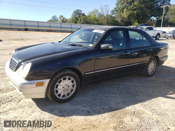 2000 Mercedes-Benz E-Class AWD with VIN WDBJF82JXYX035315, listed as a Copart auction lot 75568454 with 166,704 mi miles and Salvage Title. Bid and sale history available at carsss.com. Image 1.