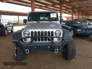 2010 Jeep Wrangler Unlimited Sport with VIN 1J4BA3H18AL161243, listed as a IAAI auction lot 41960370 with 89,004 mi miles. Bid and sale history available at carsss.com. Image 12.