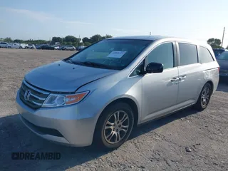 2013 Honda Odyssey EX-L with VIN 5FNRL5H67DB008575, listed as a IAAI auction lot 42008315 with 131,984 mi miles and . Bid and sale history available at carsss.com. Image 2.