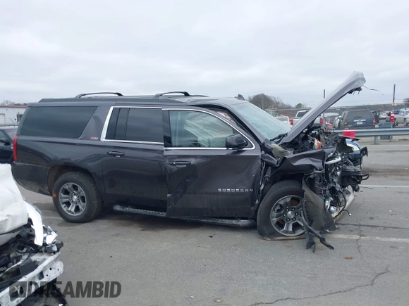 2017 Chevrolet Suburban LT z VIN 1GNSKHKC2HR315082, wystawiony jako IAAI lot #41545420 z przebiegiem 117 565 mil mil oraz . Historia ofert i sprzedaży dostępna na DreamBid. Obrazek 13.