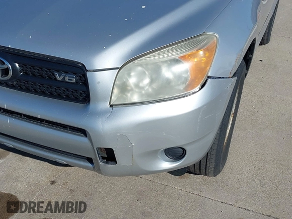 2006 Toyota RAV4 with VIN JTMBK33VX66000704, listed as a IAAI auction lot 41884109 with 256,711 mi miles. Bid and sale history available at carsss.com. Image 6.