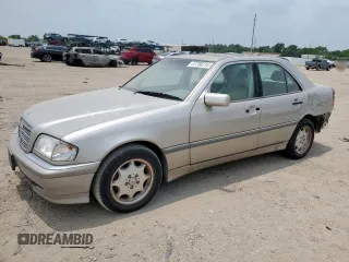 1999 Mercedes-Benz C 230/260/280/320 z VIN WDBHA24G4XA681981, wystawiony jako Copart lot #57758215 z przebiegiem Nie podano mil oraz Szkoda całkowita • Salvage title. Historia ofert i sprzedaży dostępna na DreamBid. Obrazek 1.