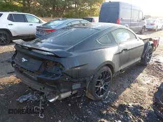 2019 Ford Mustang EcoBoost z VIN 1FA6P8TH7K5180949, wystawiony jako IAAI lot #42093614 z przebiegiem 82 936 mil mil oraz . Historia ofert i sprzedaży dostępna na DreamBid. Obrazek 4.