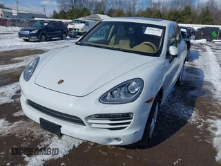 2014 Porsche Cayenne with VIN WP1AA2A2XELA95734, listed as a IAAI auction lot 41583908 with 95,751 mi miles and . Bid and sale history available at DreamBid. Image 2.