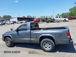 2003 Dodge Dakota with VIN 1D7FL16X53S361797, listed as a IAAI auction lot 42056555 with 243,771 mi miles and . Bid and sale history available at carsss.com. Image 15.