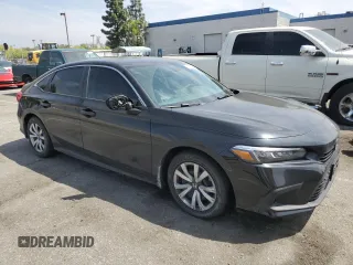 2024 Honda Civic LX z VIN 2HGFE2F23RH572531, wystawiony jako Copart lot #52685515 z przebiegiem 14 750 mil mil oraz Szkoda całkowita • Salvage title. Historia ofert i sprzedaży dostępna na DreamBid. Obrazek 4.