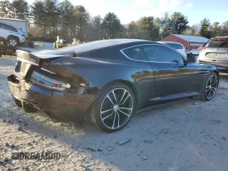 2012 Aston Martin DBS z VIN SCFFBCBD0CGE03238, wystawiony jako Copart lot #87450334 z przebiegiem 89 666 mil mil oraz Tytuł czysty. Historia ofert i sprzedaży dostępna na DreamBid. Obrazek 3.