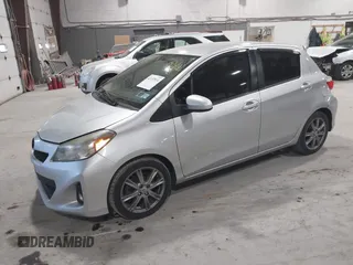 2012 Toyota Yaris L with VIN JTDKTUD31CD511550, listed as a IAAI auction lot 42157934 with 131,183 mi miles. Bid and sale history available at carsss.com. Image 2.