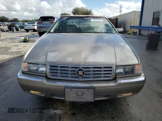 2000 Cadillac Eldorado z VIN 1G6EL12Y7YB703863, wystawiony jako Copart lot #85433244 z przebiegiem 175 416 mil mil oraz Szkoda całkowita • Salvage title. Historia ofert i sprzedaży dostępna na DreamBid. Obrazek 5.