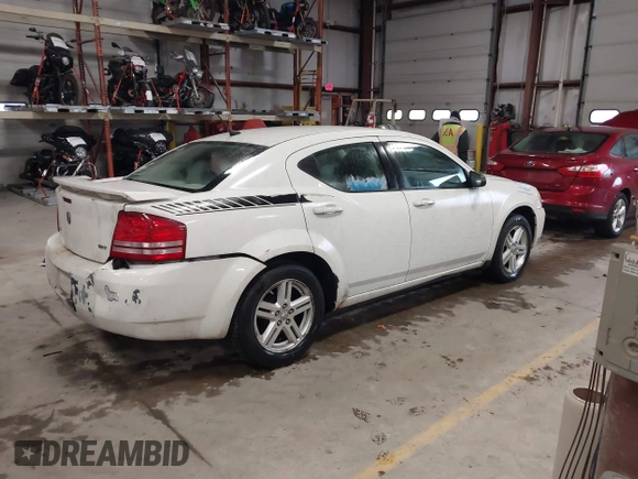 2008 Dodge Avenger SXT with VIN 1B3LC56K98N282097, listed as a IAAI auction lot 41380832 with 220,631 mi miles. Bid and sale history available at carsss.com. Image 4.