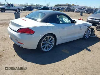 2011 BMW Z4 sDrive35i with VIN WBALM7C55BE383700, listed as a IAAI auction lot 41852272 with 101,562 mi miles. Bid and sale history available at carsss.com. Image 4.