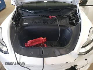 2023 Tesla Model Y Long Range z VIN 7SAYGDEE5PA067389, wystawiony jako Copart lot #54109625 z przebiegiem 24 849 mil mil oraz Szkody całkowita. Historia ofert i sprzedaży dostępna na DreamBid. Obrazek 12.