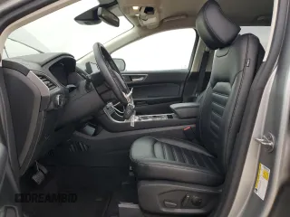 2023 Ford Edge SEL z VIN 2FMPK4J90PBA38667, wystawiony jako Copart lot #87404284 z przebiegiem Nie podano mil oraz Szkoda całkowita • Salvage title. Historia ofert i sprzedaży dostępna na DreamBid. Obrazek 7.