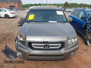 2010 Honda Ridgeline RTL with VIN 5FPYK1F50AB003576, listed as a IAAI auction lot 42050763 with 183,197 mi miles. Bid and sale history available at carsss.com. Image 12.