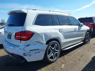 2018 Mercedes-Benz GLS 550 with VIN 4JGDF7DE8JB029455, listed as a IAAI auction lot 41674129 with 67,209 mi miles and . Bid and sale history available at DreamBid. Image 4.