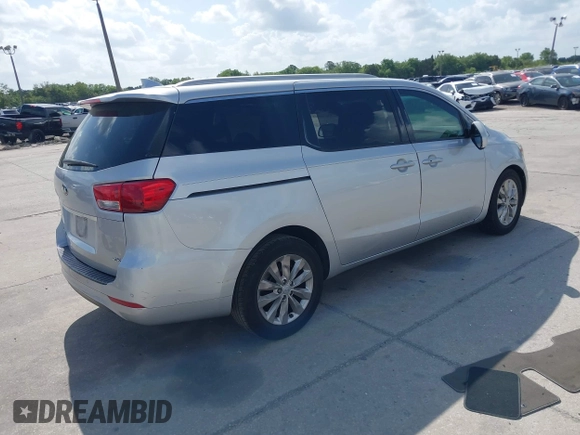 2018 Kia Sedona EX with VIN KNDMC5C12J6345930, listed as a IAAI auction lot 42008064 with 214,465 mi miles and . Bid and sale history available at carsss.com. Image 4.
