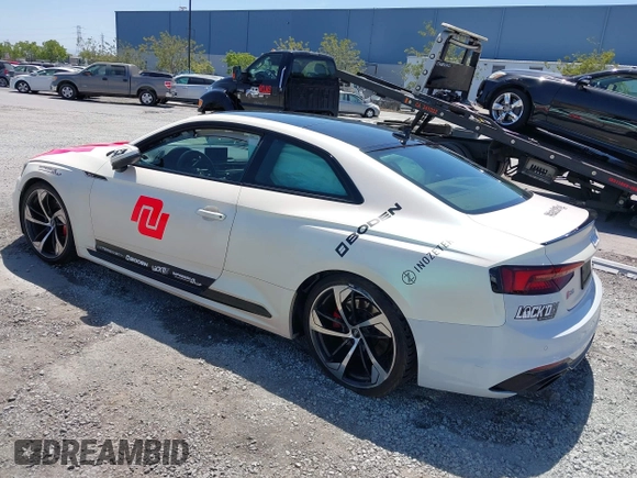 2018 Audi RS 5 z VIN WUAPWAF55JA903152, wystawiony jako IAAI lot #42193996 z przebiegiem 95 730 mil mil oraz . Historia ofert i sprzedaży dostępna na DreamBid. Obrazek 3.