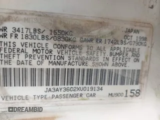 1999 Mitsubishi Mirage z VIN JA3AY36C2XU019134, wystawiony jako IAAI lot #42077649 z przebiegiem 304 426 mil mil oraz . Historia ofert i sprzedaży dostępna na DreamBid. Obrazek 9.