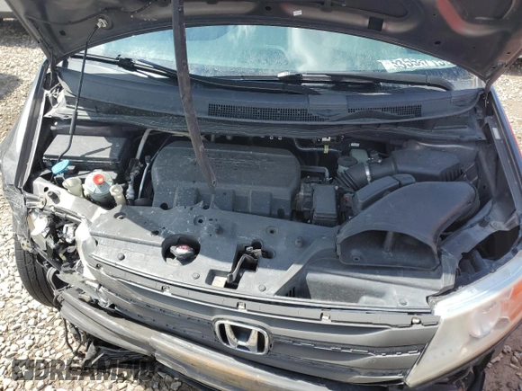 2012 Honda Odyssey Touring with VIN 5FNRL5H97CB070213, listed as a Copart auction lot 53558715 with 218,964 mi miles and Salvage title. Bid and sale history available at DreamBid. Image 12.