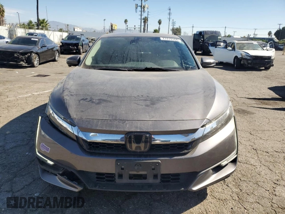 2018 Honda Clarity Plug-In Hybrid with VIN JHMZC5F17JC018537, listed as a Copart auction lot 77413144 with 74,350 mi miles and Salvage Title. Bid and sale history available at carsss.com. Image 5.