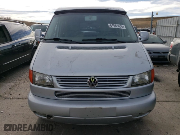 2002 Volkswagen EuroVan MV с VIN WV2NB47052H015757, выставлен на аукционе Copart как лот 81666434 с пробегом 191 543 миль миль и Чистый • Clean title. История ставок и продаж доступна на DreamBid. Изображение 5.