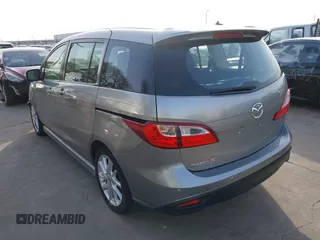 2013 Mazda 5 Touring with VIN JM1CW2CL7D0147063, listed as a IAAI auction lot 41771956 with 121,279 mi miles. Bid and sale history available at carsss.com. Image 3.