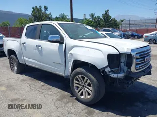 2016 GMC Canyon 2WD SLT z VIN 1GTG5DE31G1377063, wystawiony jako IAAI lot #42532519 z przebiegiem 92 889 mil mil oraz . Historia ofert i sprzedaży dostępna na DreamBid. Obrazek 1.