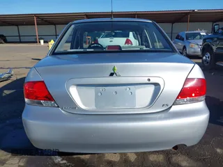 2006 Mitsubishi Lancer ES with VIN JA3AJ26E06U057959, listed as a IAAI auction lot 41347649 with 122,963 mi miles. Bid and sale history available at carsss.com. Image 17.