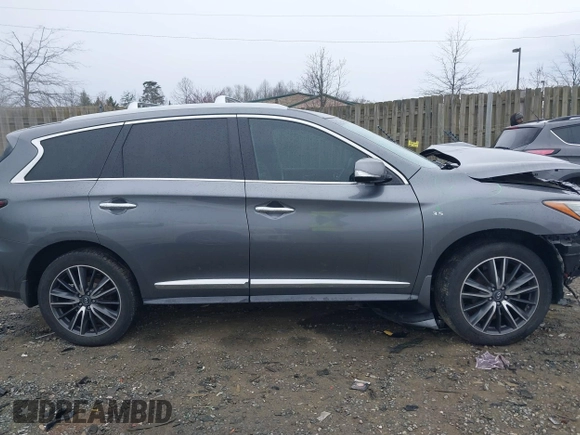 2016 Infiniti QX60 with VIN 5N1AL0MM1GC502111, listed as a IAAI auction lot 41866740 with 97,360 mi miles and . Bid and sale history available at DreamBid. Image 14.