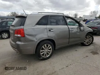 2012 Kia Sorento SX with VIN 5XYKW4A24CG243176, listed as a Copart auction lot 49816515 with 186,540 mi miles and Salvage Title. Bid and sale history available at carsss.com. Image 3.