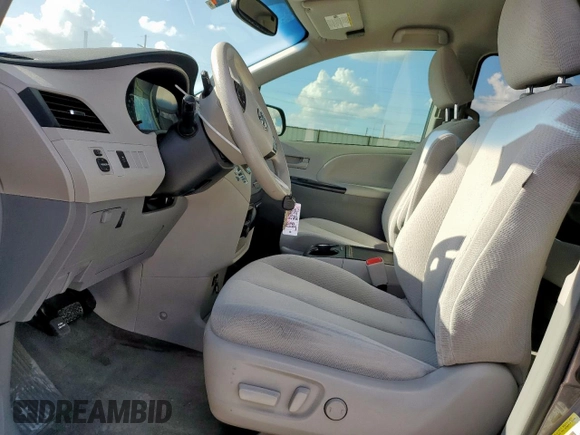 2014 Toyota Sienna LE AAS with VIN 5TDKK3DC8ES445454, listed as a Copart auction lot 62014095 with 143,601 mi miles and Salvage title. Bid and sale history available at DreamBid. Image 7.