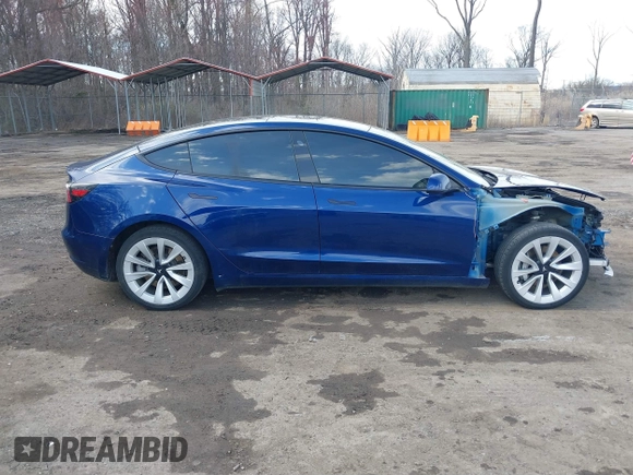 2022 Tesla Model 3 with VIN 5YJ3E1EA7NF188417, listed as a IAAI auction lot 41885623 with 105,457 mi miles and . Bid and sale history available at DreamBid. Image 13.