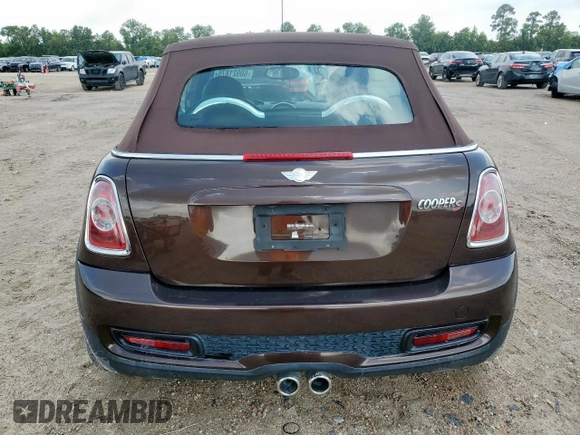 2011 MINI Convertible S with VIN WMWZP3C58BTX83725, listed as a Copart auction lot 60921875 with 45,400 mi miles and Salvage title. Bid and sale history available at DreamBid. Image 6.