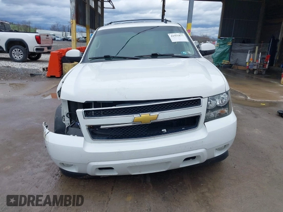 2013 Chevrolet Tahoe LT with VIN 1GNSKBE05DR293054, listed as a IAAI auction lot 41955877 with 192,474 mi miles and . Bid and sale history available at DreamBid. Image 13.