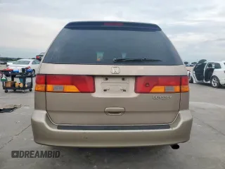 2004 Honda Odyssey EX-L with VIN 5FNRL18944B107051, listed as a Copart auction lot 58542335 with 207,951 mi miles and Salvage title. Bid and sale history available at DreamBid. Image 6.