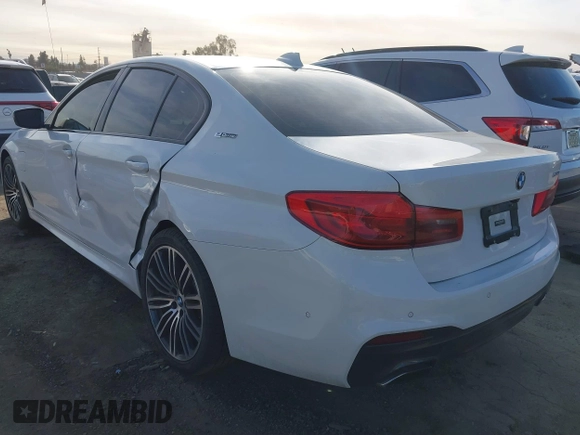 2019 BMW 5 Series 530e iPerformance with VIN WBAJA9C55KB254885, listed as a IAAI auction lot 41398164 with 62,781 mi miles. Bid and sale history available at carsss.com. Image 3.