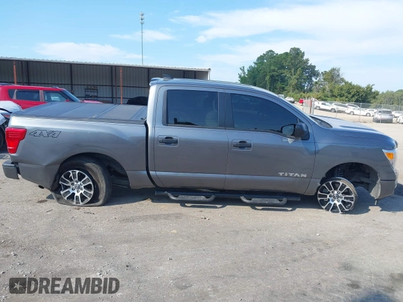 2023 Nissan Titan SV with VIN 1N6AA1EC6PN101712, listed as a IAAI auction lot 40206621 with 50,210 mi miles and . Bid and sale history available at DreamBid. Image 6.
