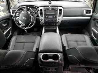 2018 Nissan Titan Pro-4X z VIN 1N6AA1E58JN523036, wystawiony jako Copart lot #45383075 z przebiegiem 153 047 mil mil oraz Czysty tytuł • Clean title. Historia ofert i sprzedaży dostępna na DreamBid. Obrazek 8.