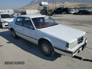 1993 Dodge Dynasty z VIN 1B3XC4632PD153627, wystawiony jako Copart lot #75645834 z przebiegiem 199 336 mil mil oraz Szkoda całkowita • Salvage title. Historia ofert i sprzedaży dostępna na DreamBid. Obrazek 4.