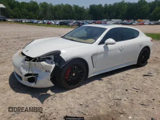 2013 Porsche Panamera S with VIN WP0AB2A76DL060763, listed as a Copart auction lot 61995675 with 105,918 mi miles and Salvage title. Bid and sale history available at DreamBid. Image 1.