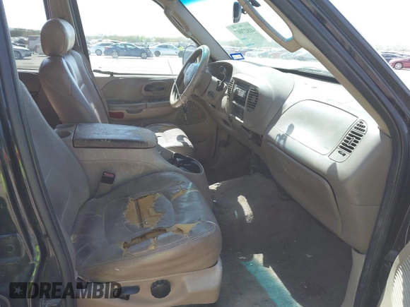 2003 Ford F-150 XLT with VIN 1FTRW07L53KC01651, listed as a IAAI auction lot 41827007 with 233,842 mi miles and . Bid and sale history available at DreamBid. Image 5.
