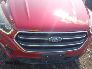 2017 Ford Escape SE z VIN 1FMCU9GD4HUA10240, wystawiony jako IAAI lot #42392522 z przebiegiem 82 325 mil mil oraz . Historia ofert i sprzedaży dostępna na DreamBid. Obrazek 6.